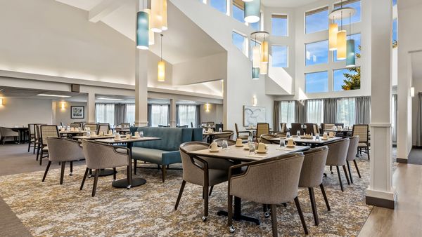 Holiday Blair House senior living residence dining room with plenty of natural lighting.