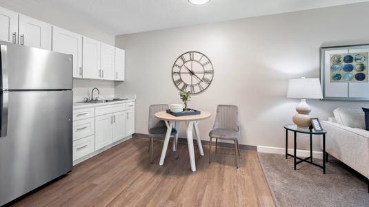 Modern apartment kitchenette and dining area