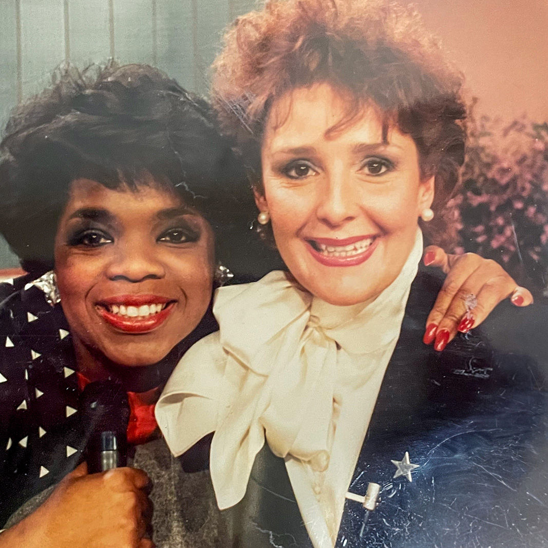 Holiday resident, Patty, photographed with Oprah Winfrey in the 1990's