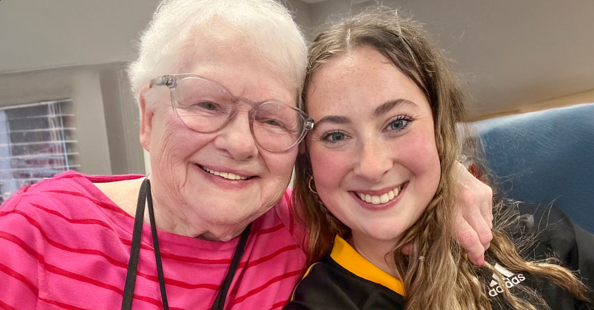 Sarah Alexi, the Engage Life Coordinator at Holiday Crescent Heights photographed with female resident