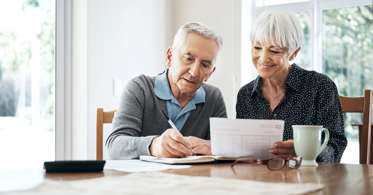 Older couple doing paper work together