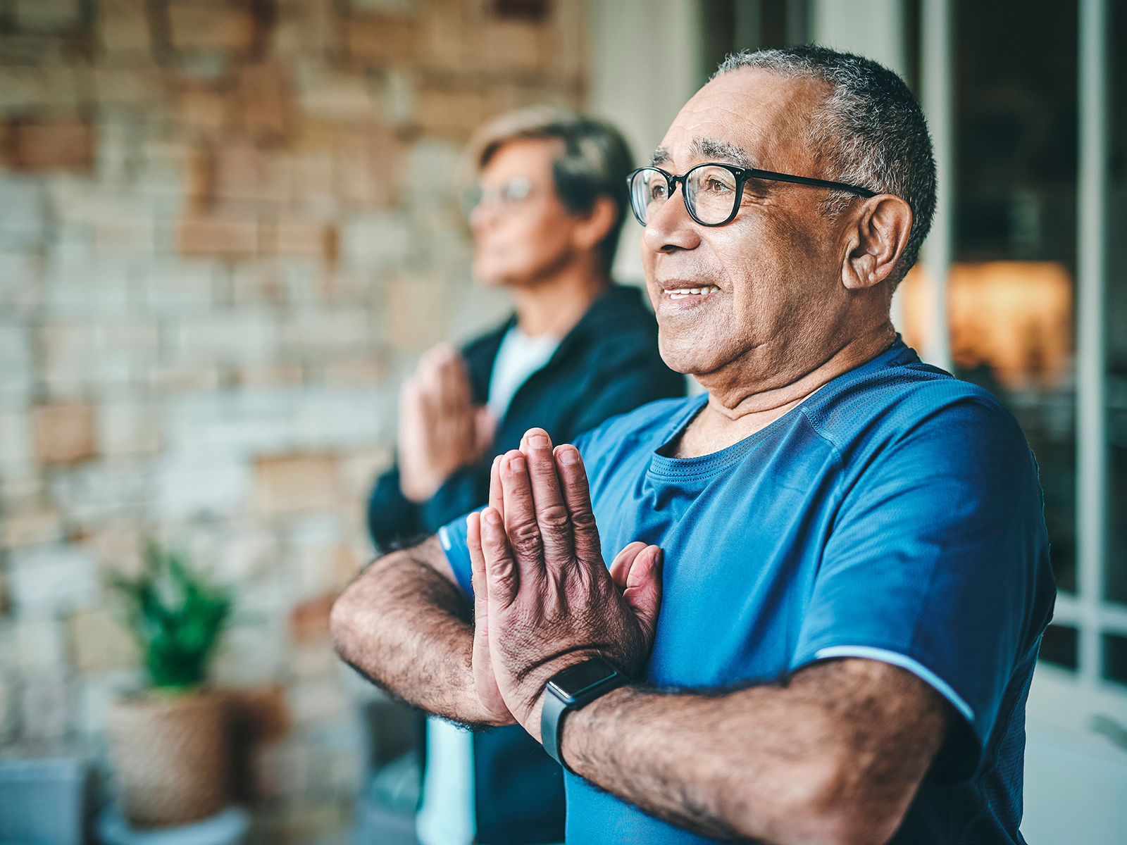 senior asian man practicing mindful meditation and yoga