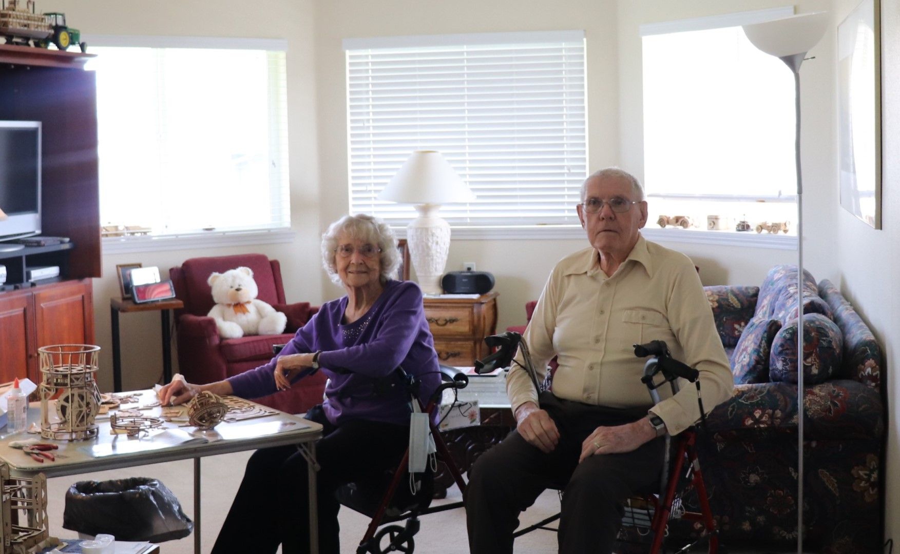 Holiday residents Lloyd Lane and Anita Siglin in their apartment doing a puzzle
