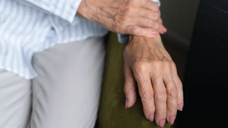 Senior holding their wrist