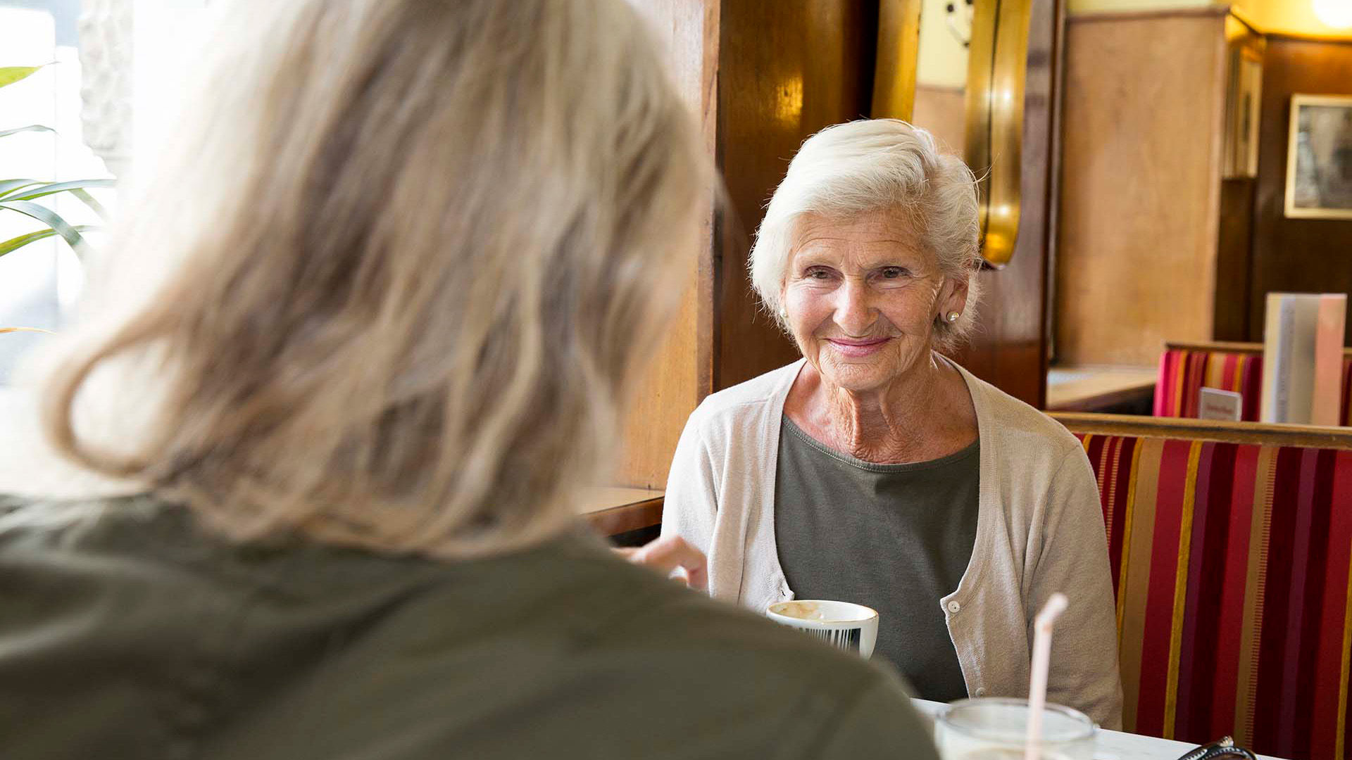 Senior woman having coffee together