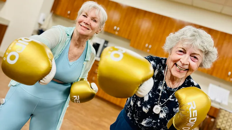 Residents at Atria Tarzana in Los Angeles participate in boxing classes led by a former professional fighter.