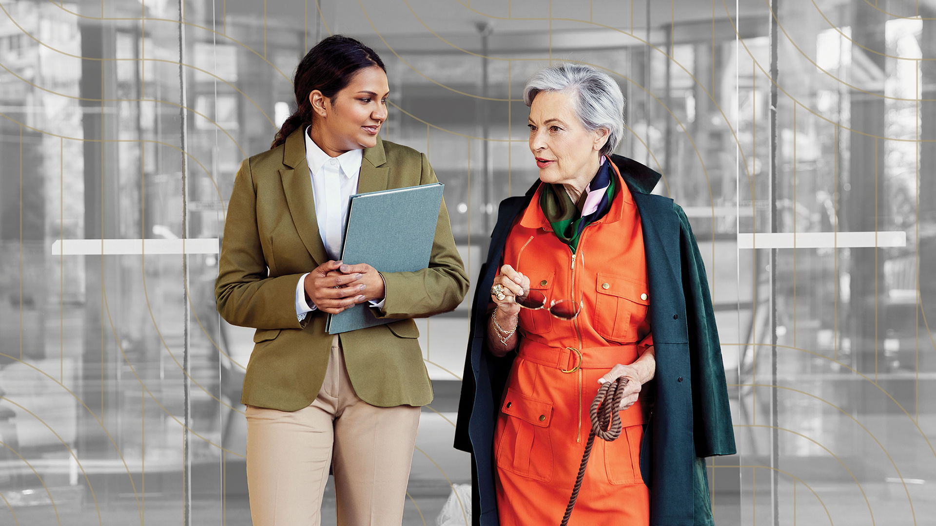 Senior woman and Coterie employee walking