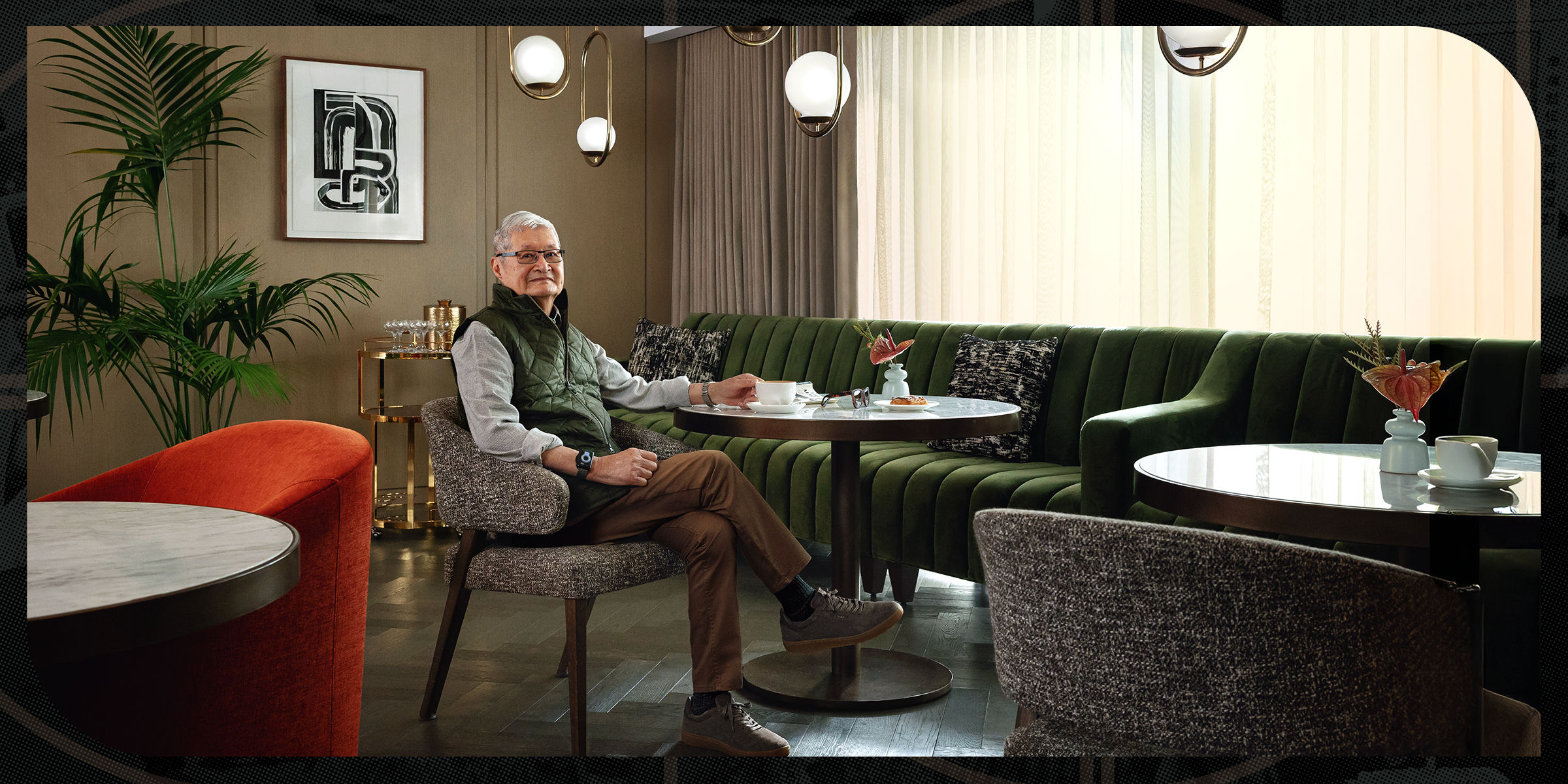 Coterie Cathedral Hill Resident of Distinction William Lee poses in a lounge area.