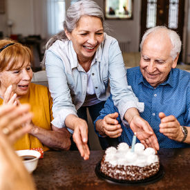 A group of seniors celebrating a birthday