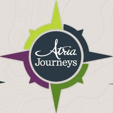 Atria Journeys logo resembling a compass