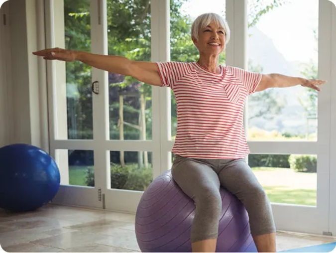 senior woman on yoga ball