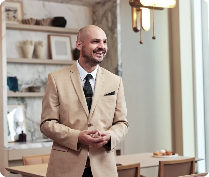 Coterie staff member smiling in the lobby