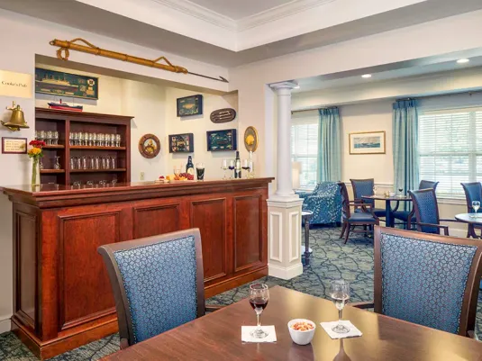 Atria Fairhaven pub with a full bar and seating.
