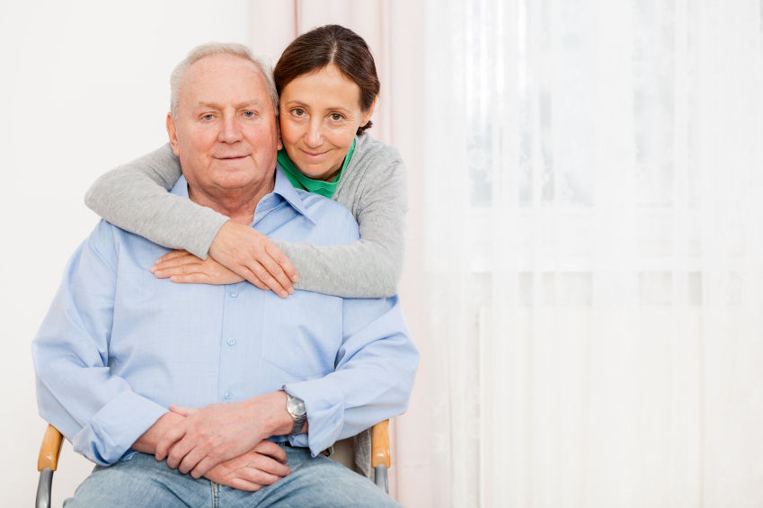 Woman hugging man from behind