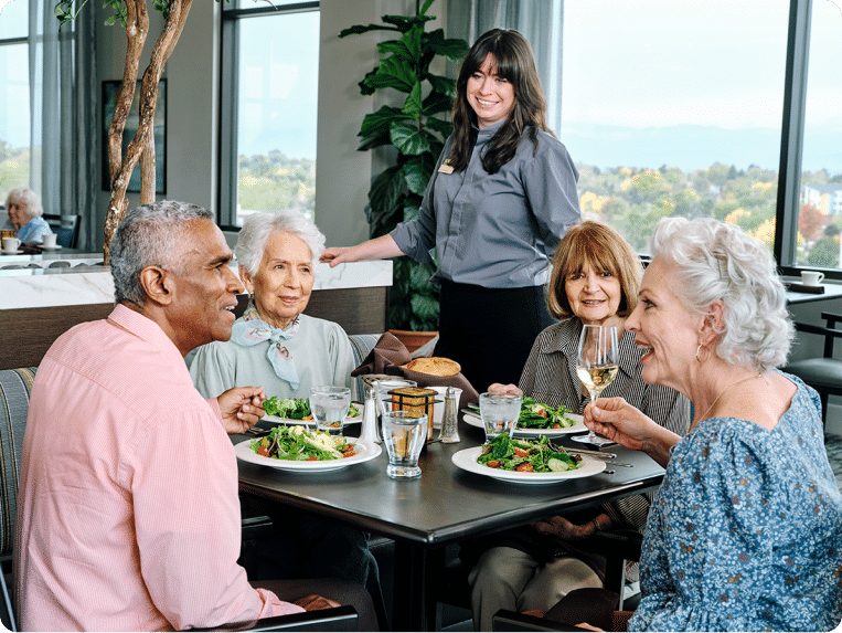 Atria Senior Living residents enjoying a meal together