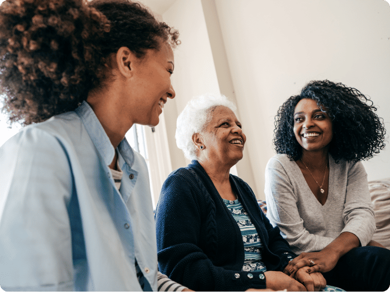 Senior woman and two younger woman enjoying time together