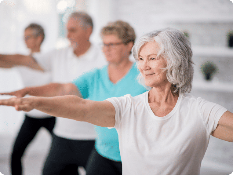 Four seniors doing yoga together