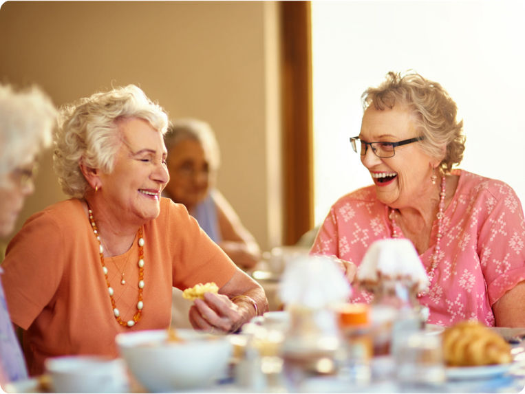Three ladies having lunch together at their senior living community