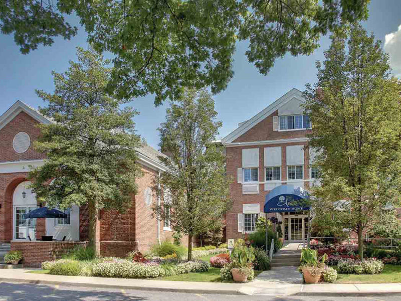 Exterior entrance to Atria East Northport Senior Living