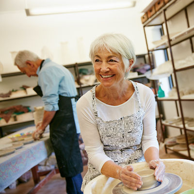 Shot of a senior couple working with ceramics in a workshop