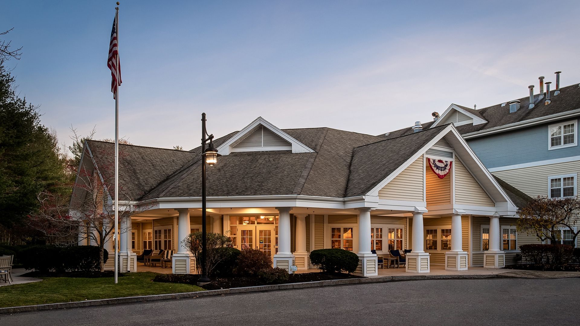 Exterior of Atria Kennebunk at dusk