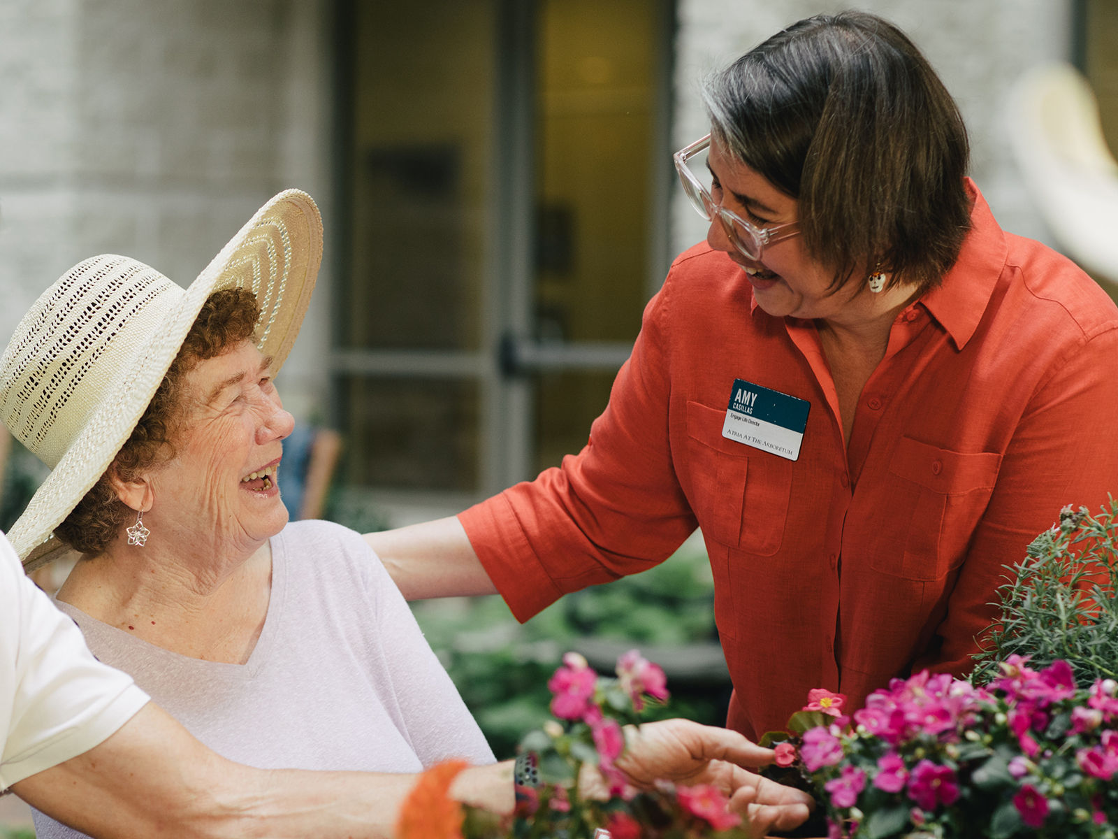 Senior resident gardening outside