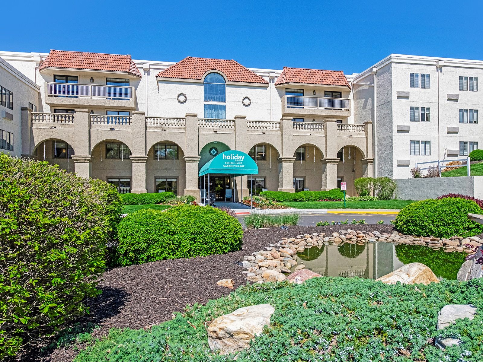 Exterior view of Holiday Garden Village senior living community