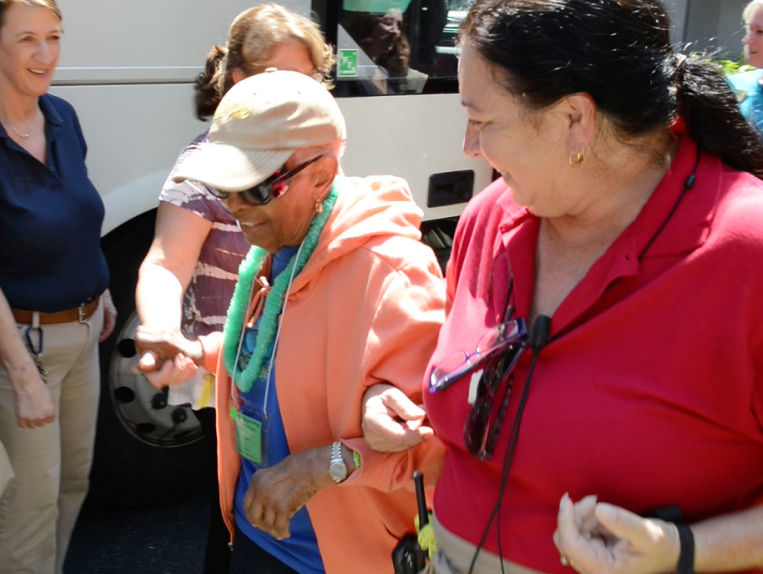 Senior woman being assisted by nurse