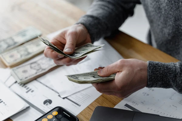 person counting money