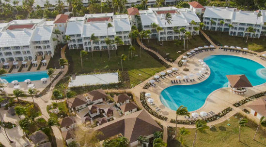 Aerial view of the swimming pools and luxury resort The Reserve at Paradisus Palma Real in Punta Cana