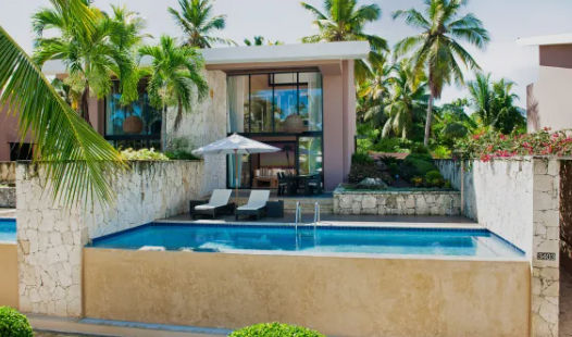 Facilities and swimming pools at Catalonia Bavaro Resort with tropical architecture