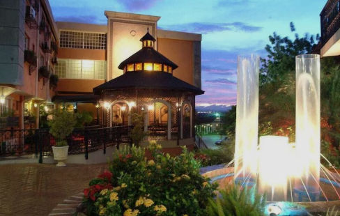 Exterior facade and entrance of Platino Hotel and Casino in Santiago de los Caballeros, Dominican Republic.
