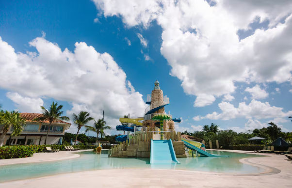 Cadaques Caribe Resort and Villas reception area surrounded by tropical vegetation