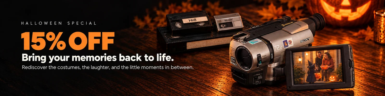 A silver camcorder shows a child receiving Halloween candy from adults at a doorway, beside VHS, Hi8 and MiniDV tapes and a glowing pumpkin.