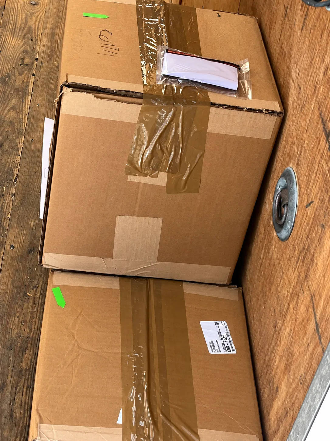 Every box gets taped, labeled and secured before we drive.