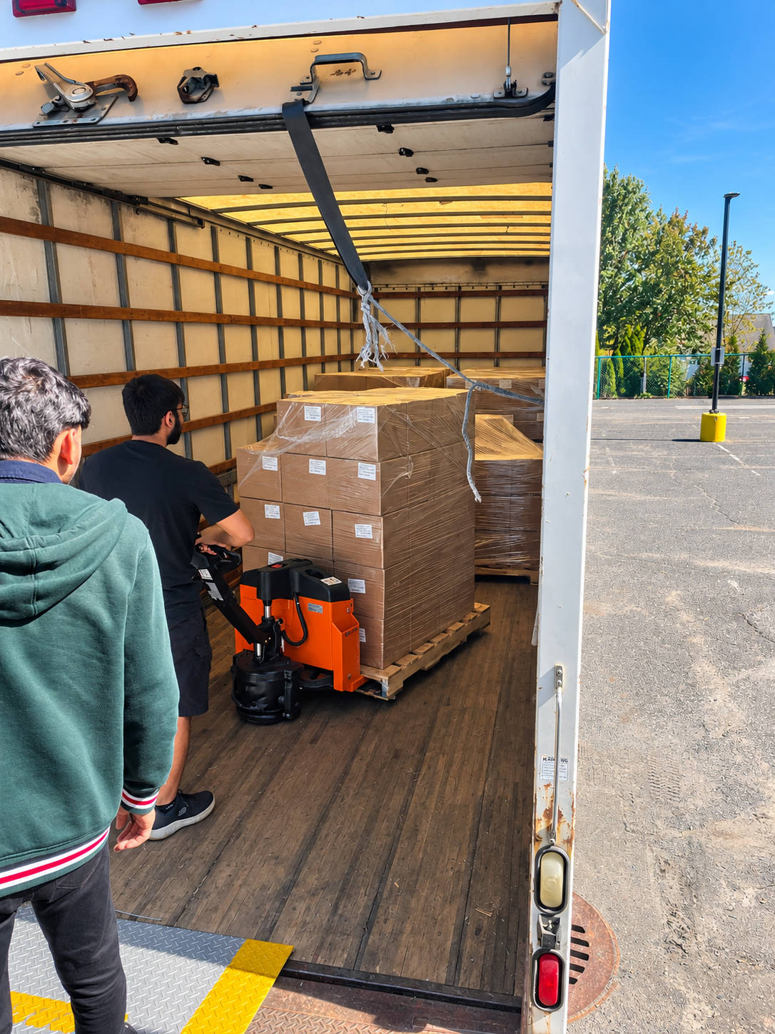 Two people on every load keep the pickup quick and careful.