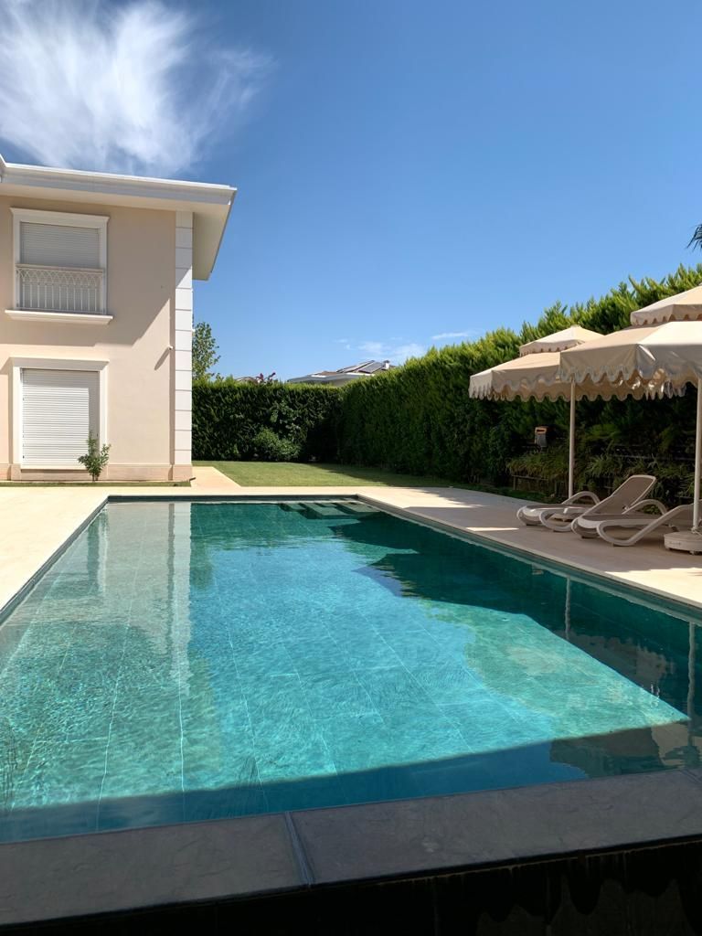 Luxury 6+1 Villa for Sale in Aksu/Kemeragzi, Antalya, Turkey – Featuring Indoor & Outdoor Pools, Sauna, and Sports Facilities.