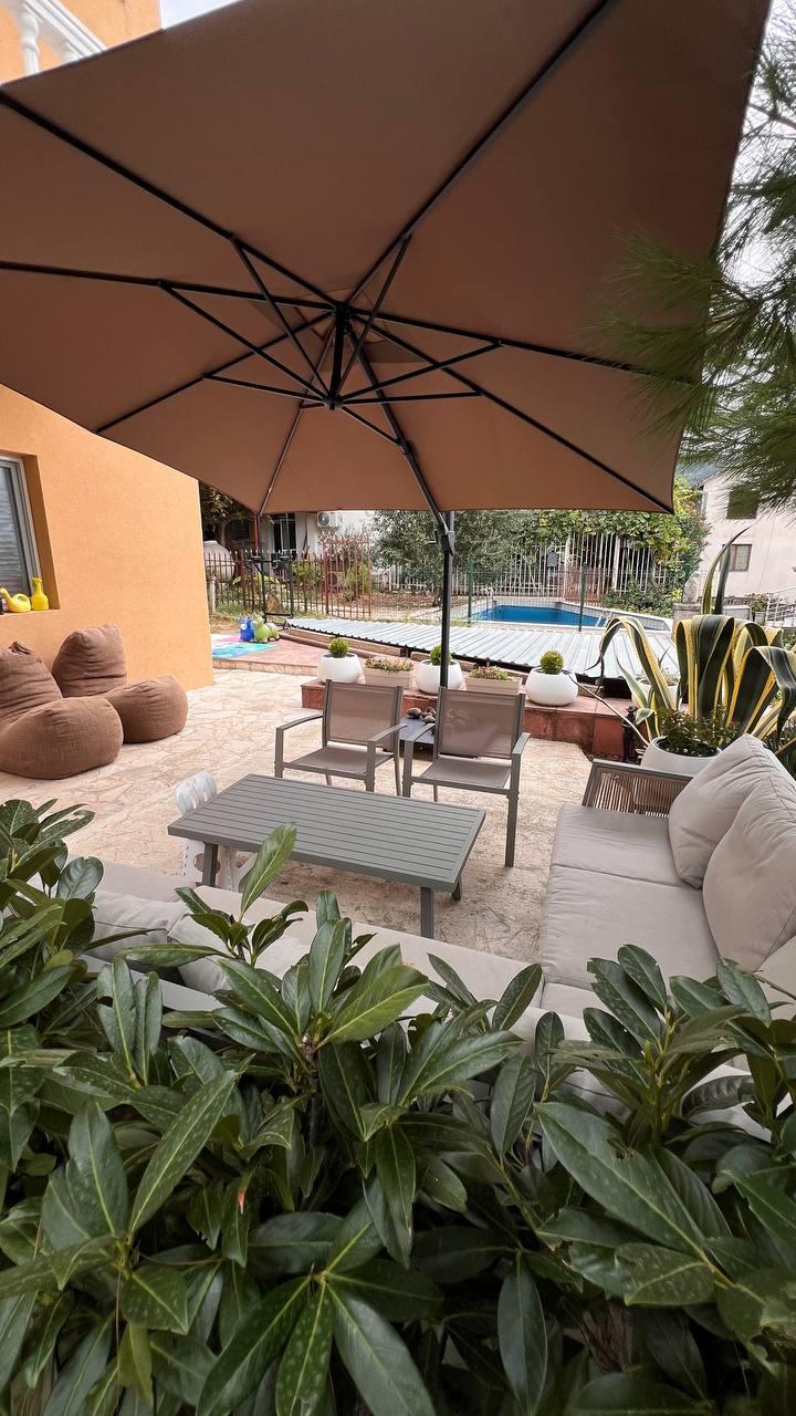 Apartment with a land plot and sea view in Montenegro.