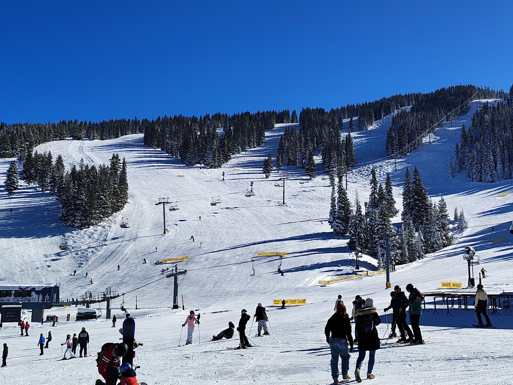 Snow-covered slopes of Vail and Breckenridge ski resorts in Colorado