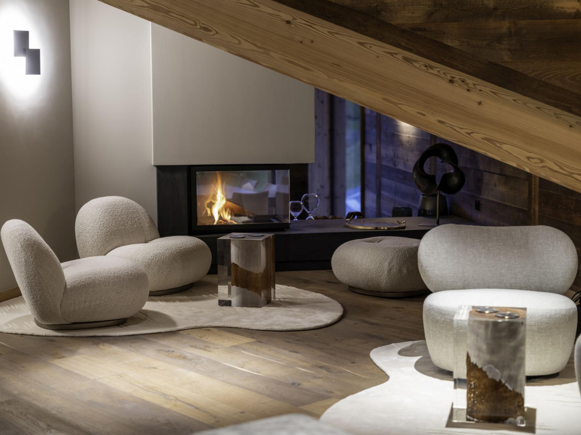 Seating nook with wood-burning fireplace and exposed timber eaves