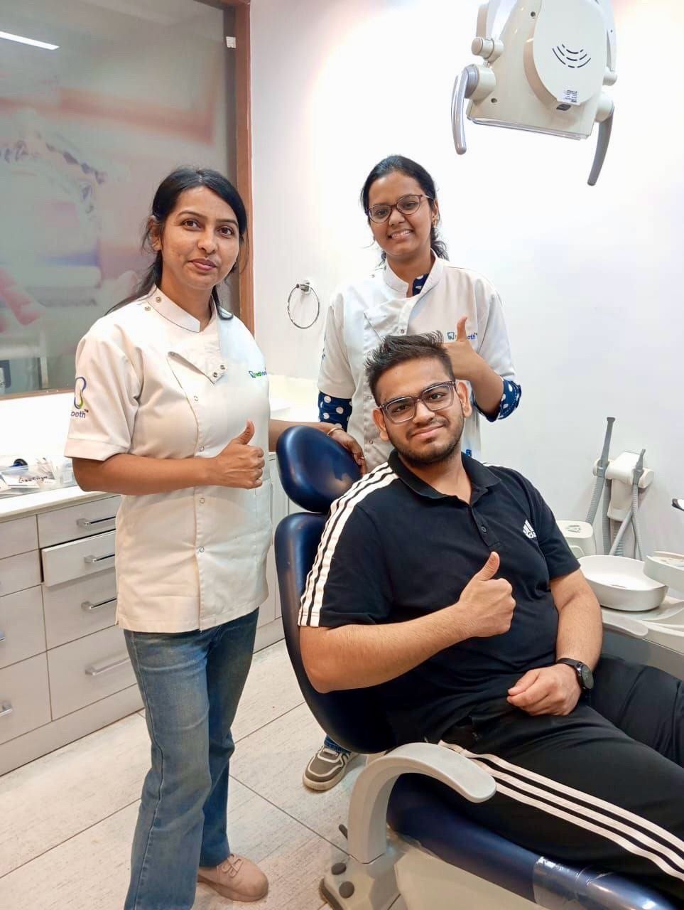 dentist,clinic,healthcare,patient,staff,smiling