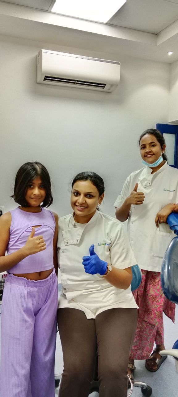  dental office,staff,clinic,thumbs up,smiling  
