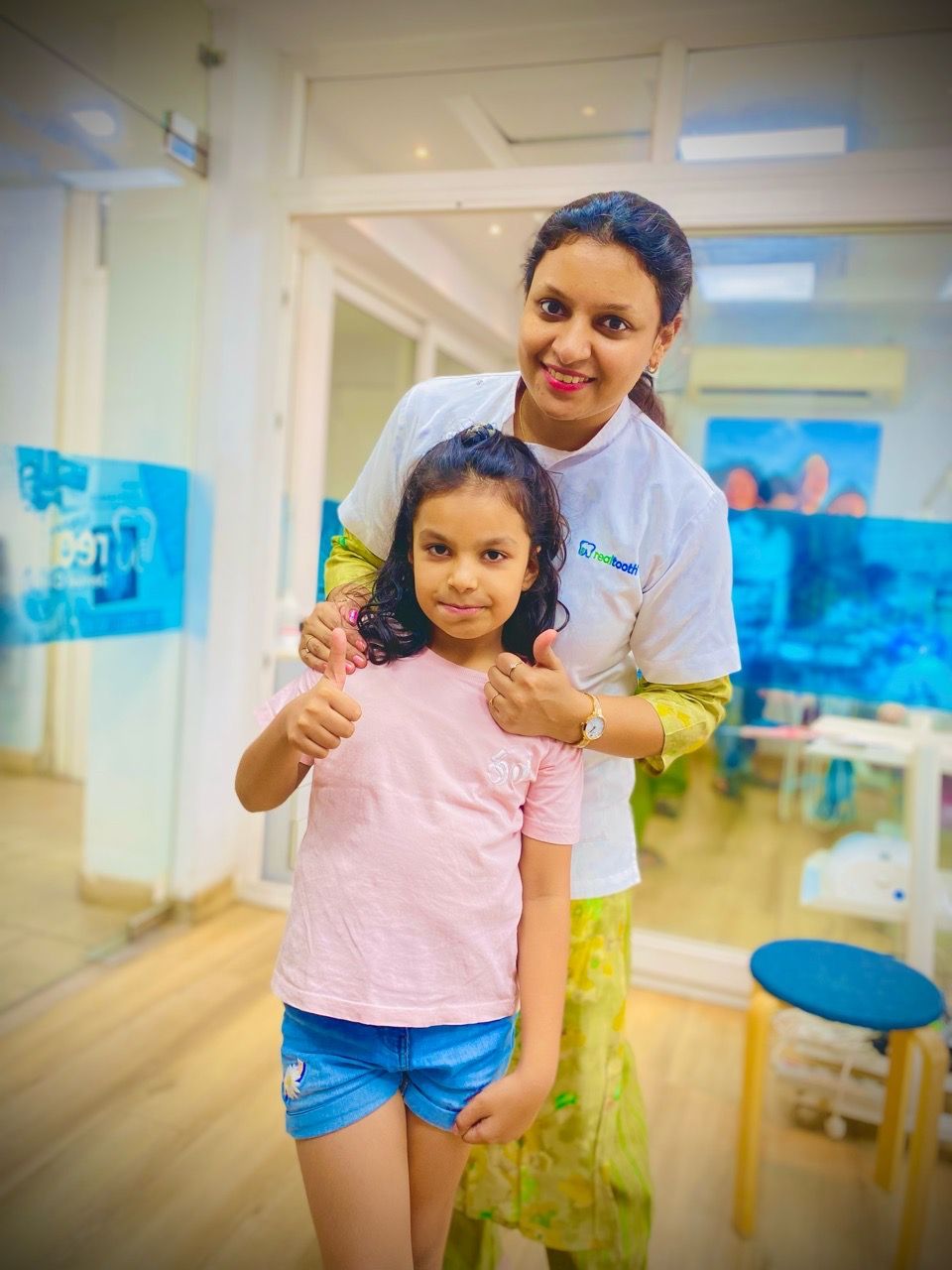  clinic,staff,child,healthcare,smiling,thumbs-up  