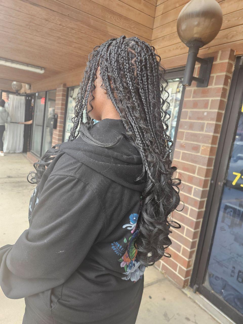  braids,curls,hairstyle,exterior,brick  