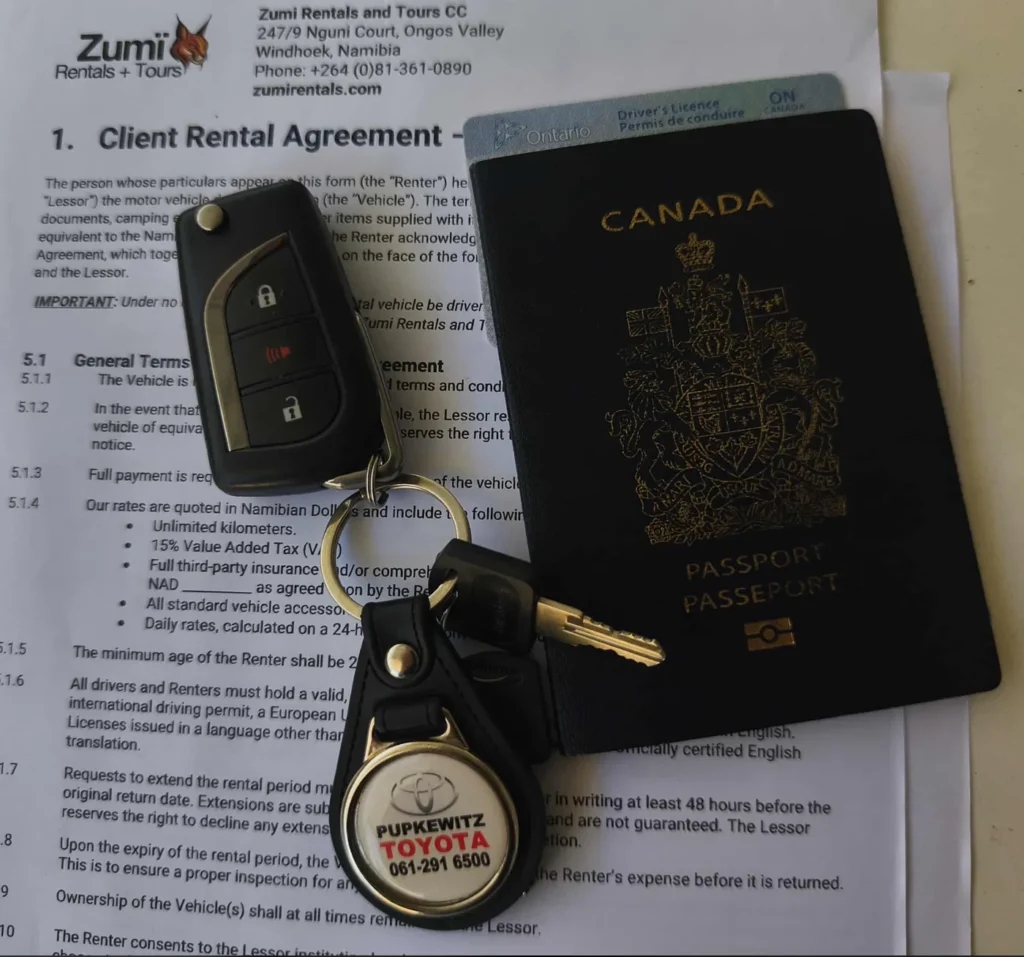 Zumi rental agreement with Toyota vehicle keys and Canadian travel documents