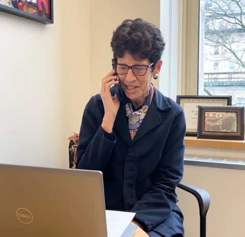 Photo of Interim Dean for Students Jenny Potter calling newly admitted students.