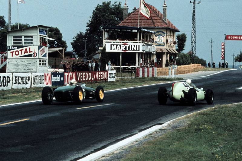 Gendebien and Ireland fight it out on the back straight