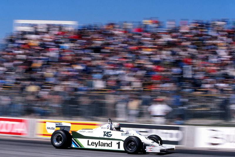 Race winner Alan Jones in a Williams FW07C.