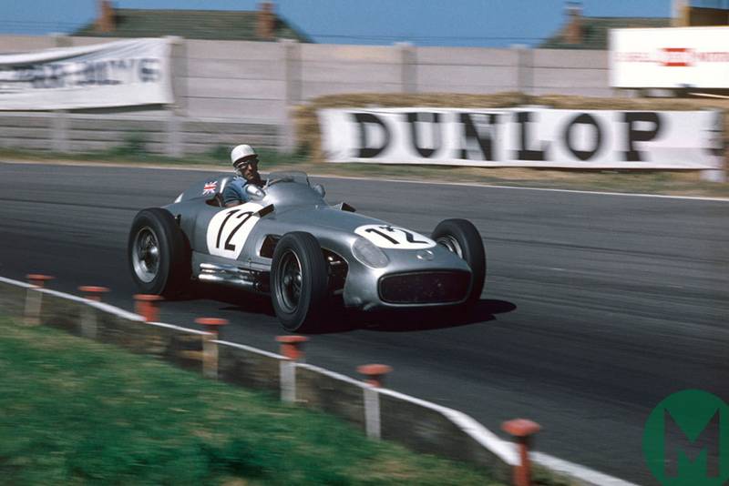 Stirling Moss leads at Aintree on the way to victory in the 1955 British Grand Prix