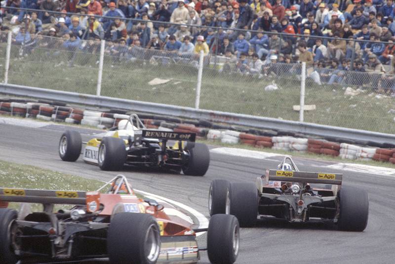 Rene Arnoux (Renault RE30B) leads Didier Pironi and Gilles Villeneuve (both Ferrari 126C2).
